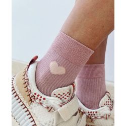 Pink mismatched socks with sequins