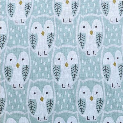 Cotton fabrics owls on a sea green background