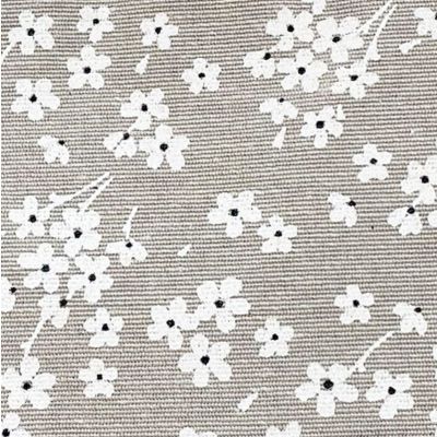 Laminated linen fabric with white flower pattern and small black dots