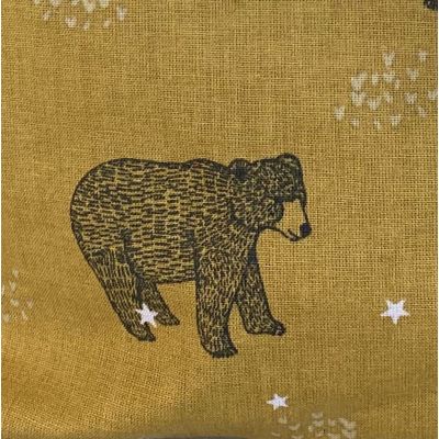 Mustard yellow cotton fabric with dark gray bear pattern