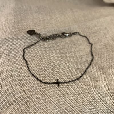 sing a song - small black cross bracelet