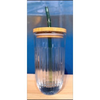 Smoothie glass with its glass straw and brush to clean it